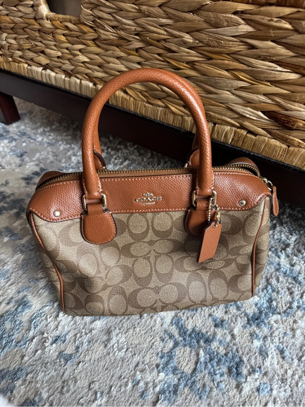 Coach women’s Tan Leather Crossbody Bag with Embossed Logo Patch